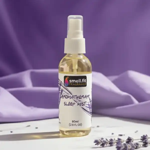 Product image of Smell.fit Fragrance Aromatherapy Sleep Mist 80ml (2.9 FL OZ) spray bottle. The bottle has a light yellow tint and is set against a soft, draped purple background, with dried lavender sprigs visible in the foreground.